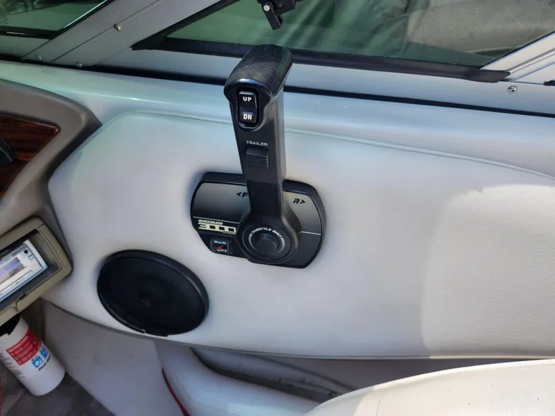 Slide: The Image of 1998 Crownline 202 CC boat throttle control and speaker system. - 10