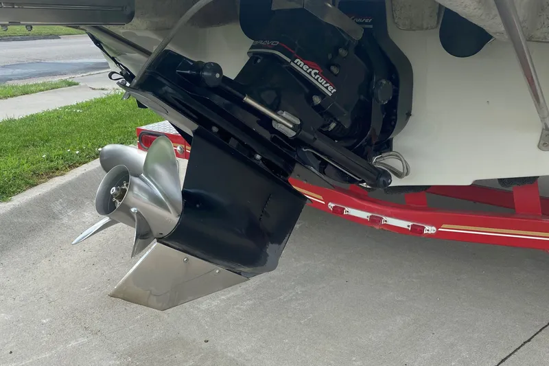 Slide: The Image of 1998 Crownline 202 CC boat with MerCruiser outdrive and propeller. - 8