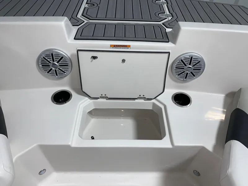 Slide: The Image of 2024 Starcraft SVX 171 boat interior with speakers and storage compartment. - 3