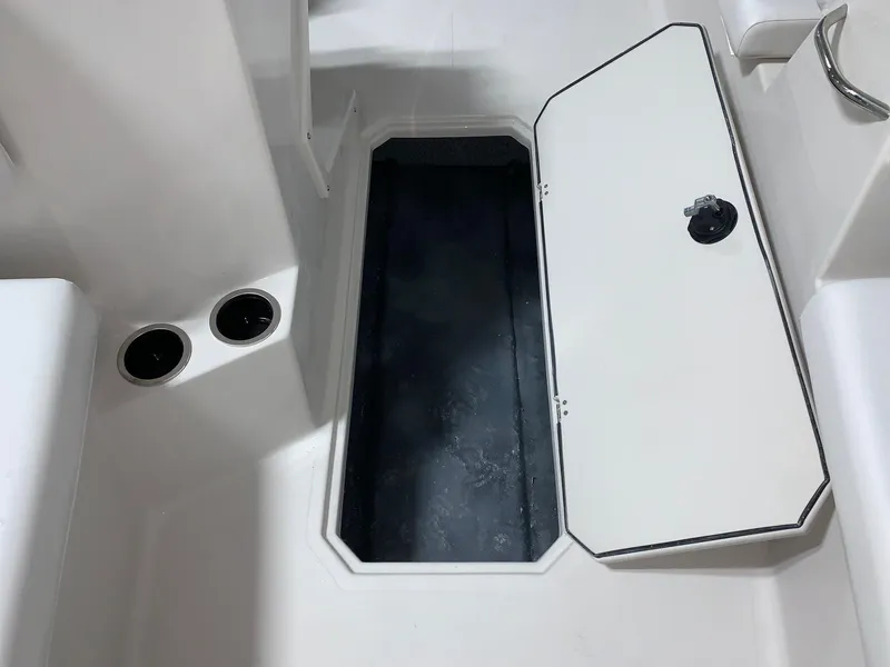 Slide: The Image of 2024 Starcraft SVX 171 boat storage compartment with open hatch. - 4