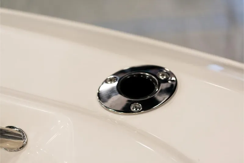 Slide: The Image of Close-up of a 2023 Sailfish 316 DC boat's stainless steel rod holder. - 17