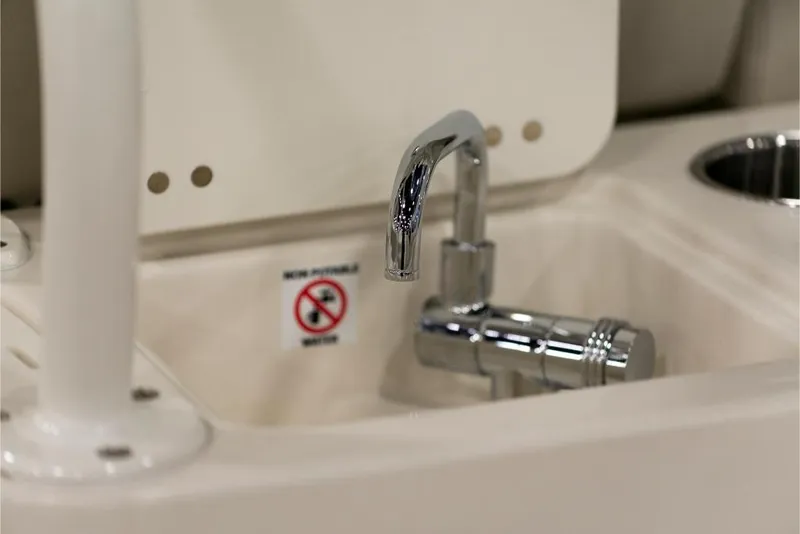 Slide: The Image of Close-up of the sink area on a 2023 Sailfish 316 DC boat. - 21