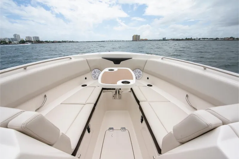 Slide: The Image of 2023 Sailfish 316 DC boat interior with spacious seating and ocean view. - 46