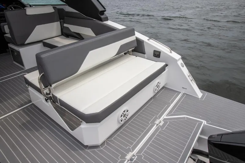 Slide: The Image of 2023 Cruisers Yachts 34 GLS I/O boat with stylish seating and deck by the water. - 20