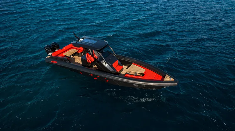 Slide: The Image of 2024 Skipper-BSK 38NC boat cruising on open water. - 0