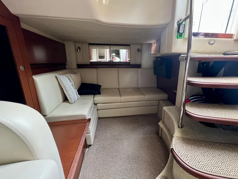 Slide: The Image of Luxurious interior of 2007 Sea Ray 40 Sundancer yacht with plush seating and elegant design. - 28