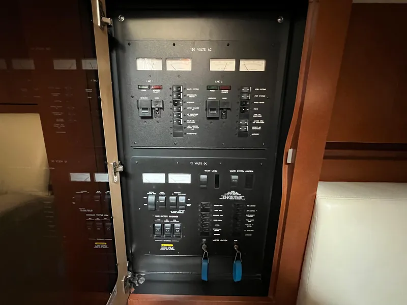 Slide: The Image of Electrical control panel on a 2007 Sea Ray 40 Sundancer yacht. - 33