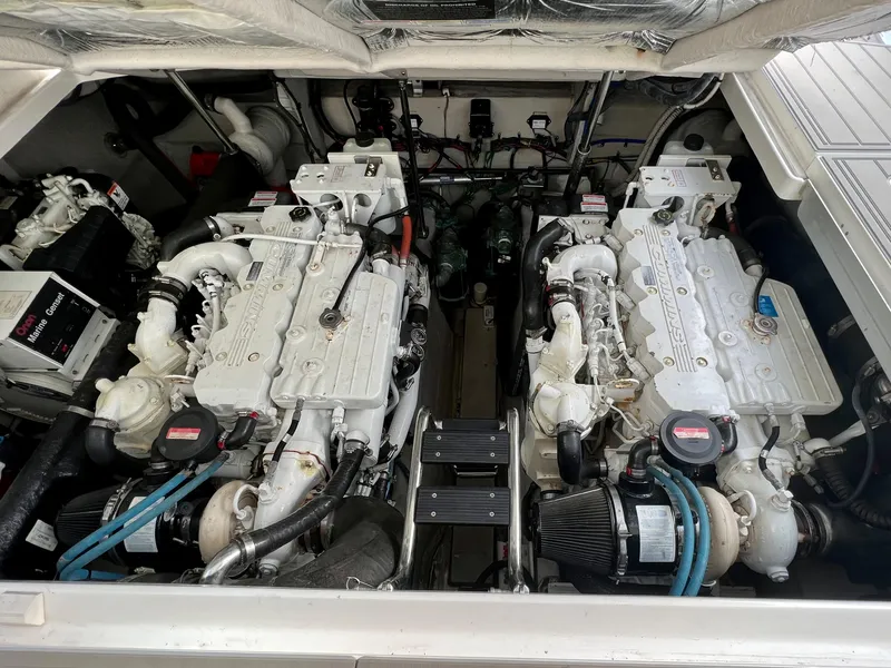 Slide: The Image of 2007 Sea Ray 40 Sundancer engine compartment with twin engines. - 38