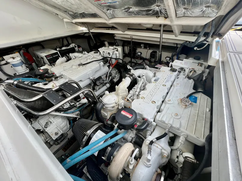 Slide: The Image of Engine room of a 2007 Sea Ray 40 Sundancer yacht showing twin engines. - 39