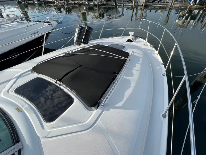 Slide: The Image of 2007 Sea Ray 40 Sundancer yacht docked at marina. - 4