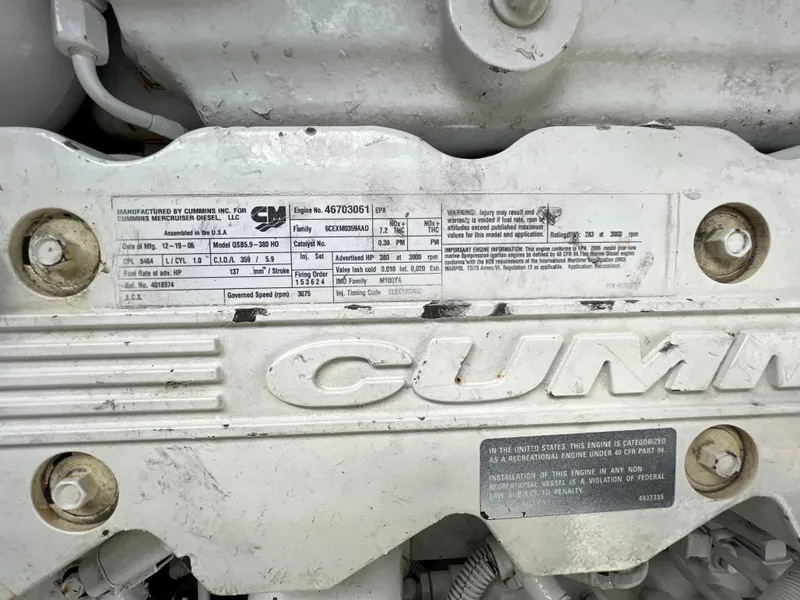 Slide: The Image of Close-up of Cummins engine label on 2007 Sea Ray 40 Sundancer boat. - 41