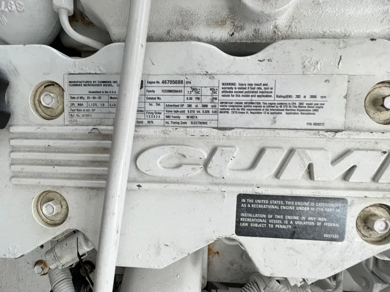 Slide: The Image of Close-up of Cummins engine label on a 2007 Sea Ray 40 Sundancer. - 42