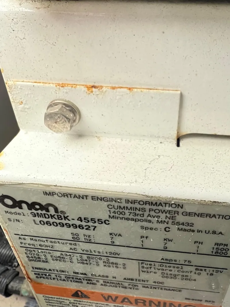 Slide: The Image of 2007 Sea Ray 40 Sundancer Cummins Onan generator label close-up - 45