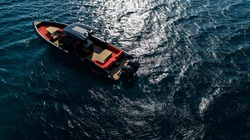 Slide: The Image of Aerial view of 2024 Skipper-BSK 38NC boat cruising on open water. - 4