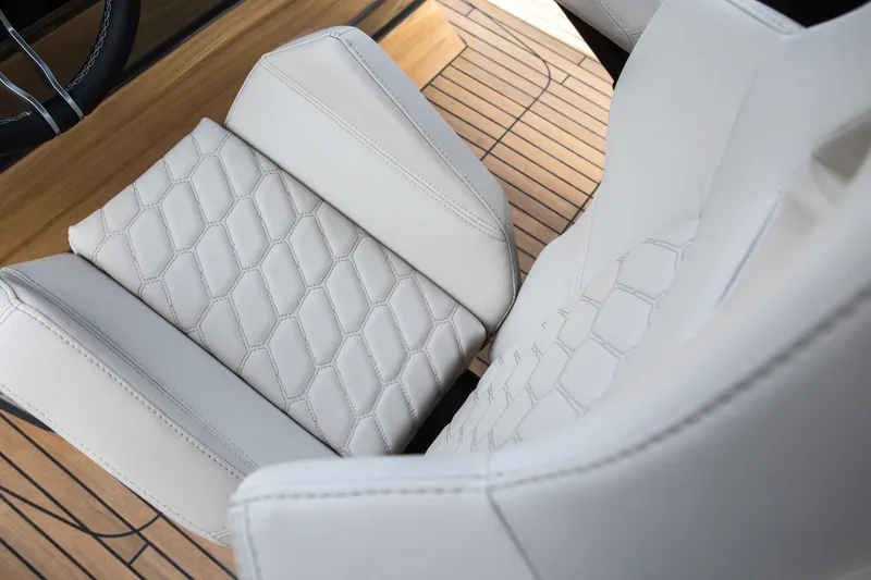 Slide: The Image of Luxurious seating on the 2024 Skipper-BSK 38NC boat with elegant diamond stitching. - 40