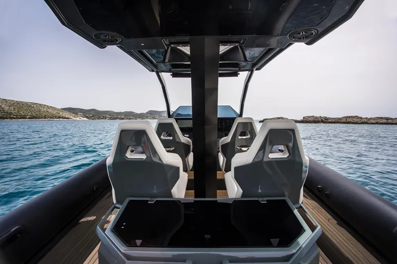 Slide: The Image of 2024 Skipper-BSK 38NC boat interior with modern seating on the water. - 42
