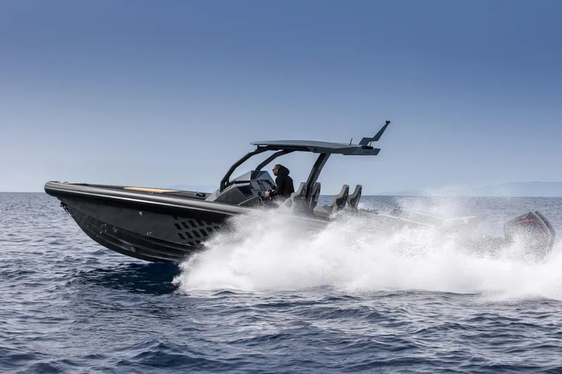 Slide: The Image of 2024 Skipper-BSK 38NC speedboat cruising on open water. - 4
