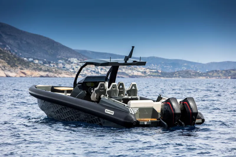 Slide: The Image of 2024 Skipper-BSK 38NC boat with triple outboard engines on the water. - 17