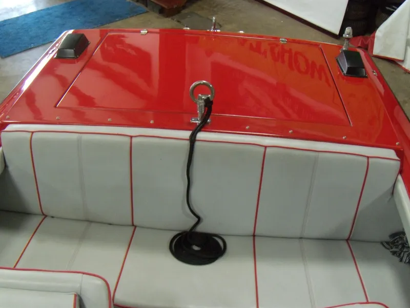 Slide: The Image of 1970 Century Mark II boat interior with red and white upholstery. - 10