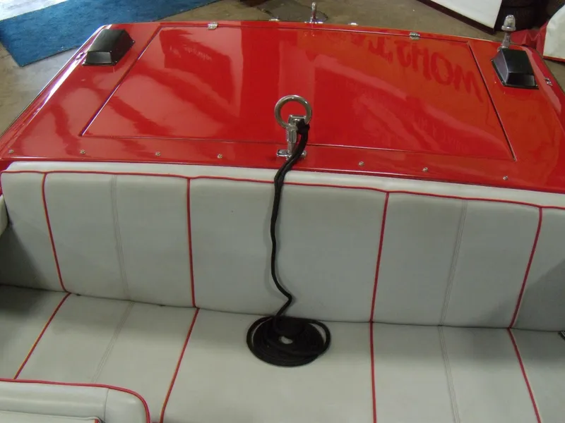 Slide: The Image of 1970 Century Mark II boat interior with red and white upholstery. - 11