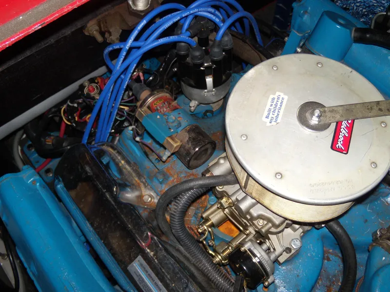 Slide: The Image of 1970 Century Mark II engine with blue wiring and components. - 14