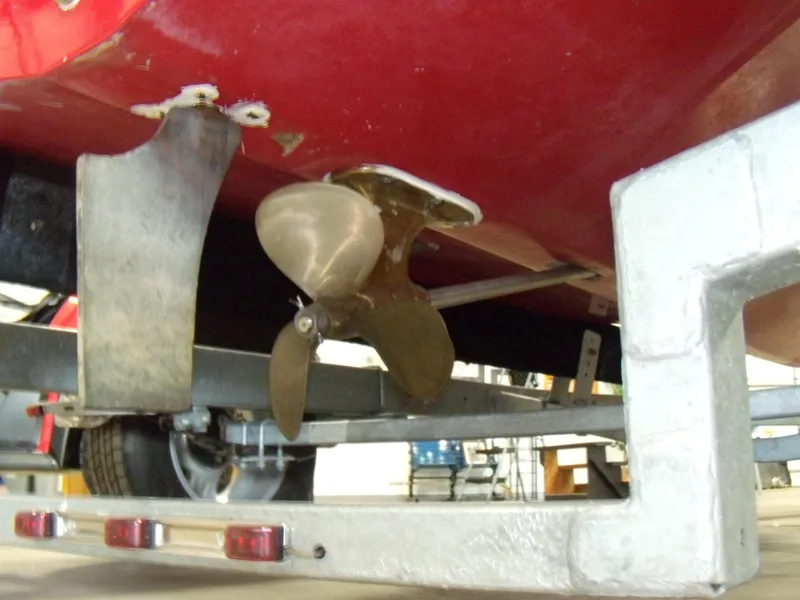 Slide: The Image of Propeller and rudder of a 1970 Century Mark II boat on a trailer. - 18