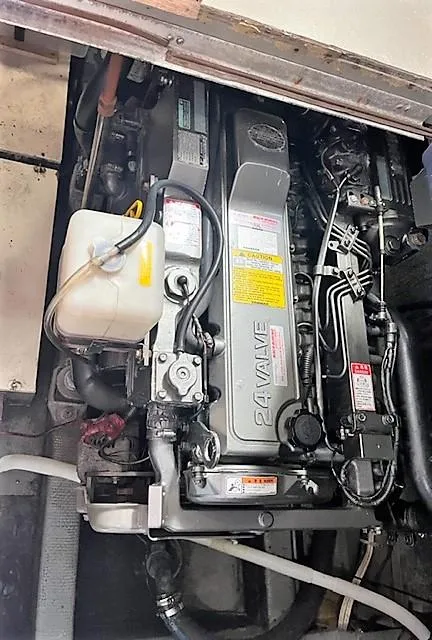 Slide: The Image of 1987 Tollycraft Sundecker Diesel engine, detailed view of mechanical components. - 30