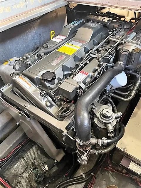 Slide: The Image of 1987 Tollycraft Sundecker Diesel engine, detailed view of mechanical components and wiring. - 40