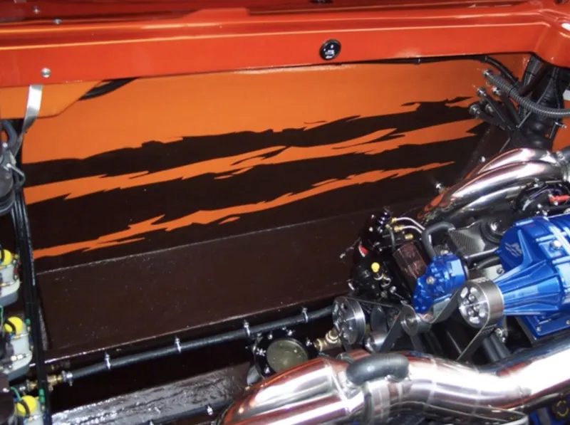 Slide: The Image of 2007 Fountain 38 Lightning engine compartment with custom paint and chrome components. - 14