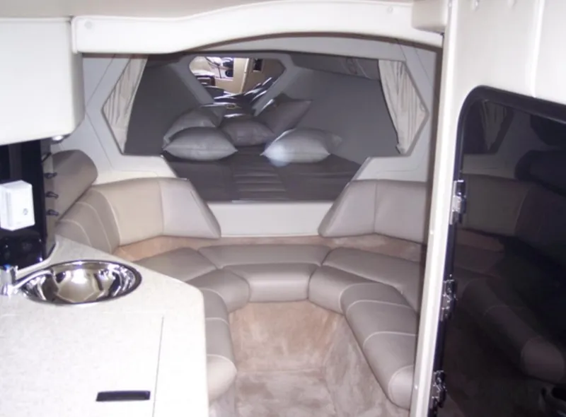 Slide: The Image of Interior cabin of 2007 Fountain 38 Lightning boat with seating and sleeping area. - 8