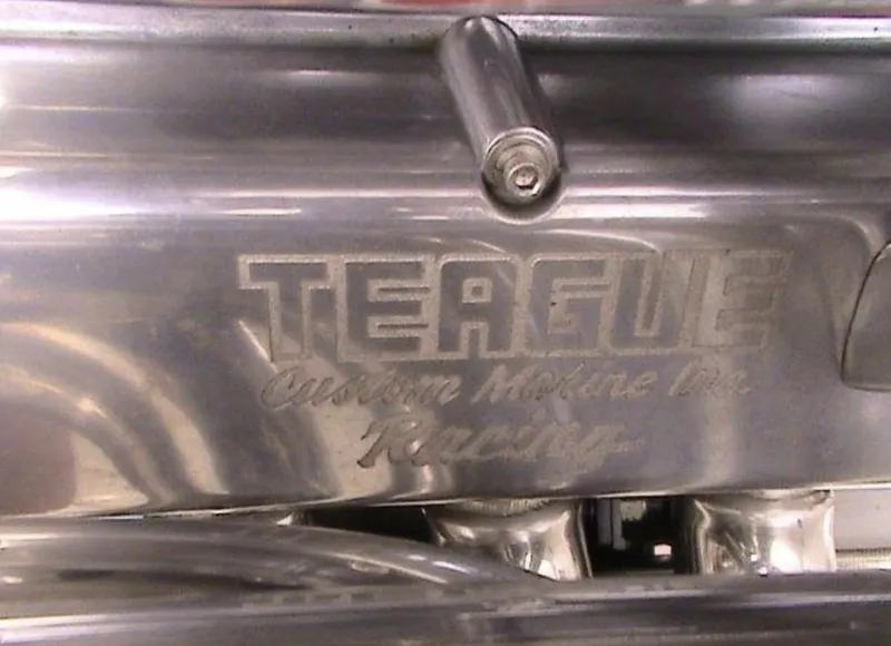 Slide: The Image of Teague Custom Marine Inc. Racing engine part on a 2006 MTI 44 boat. - 11