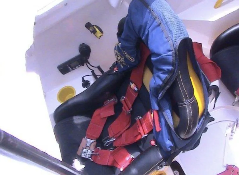 Slide: The Image of 2006 MTI 44 boat interior with safety harness and equipment. - 16