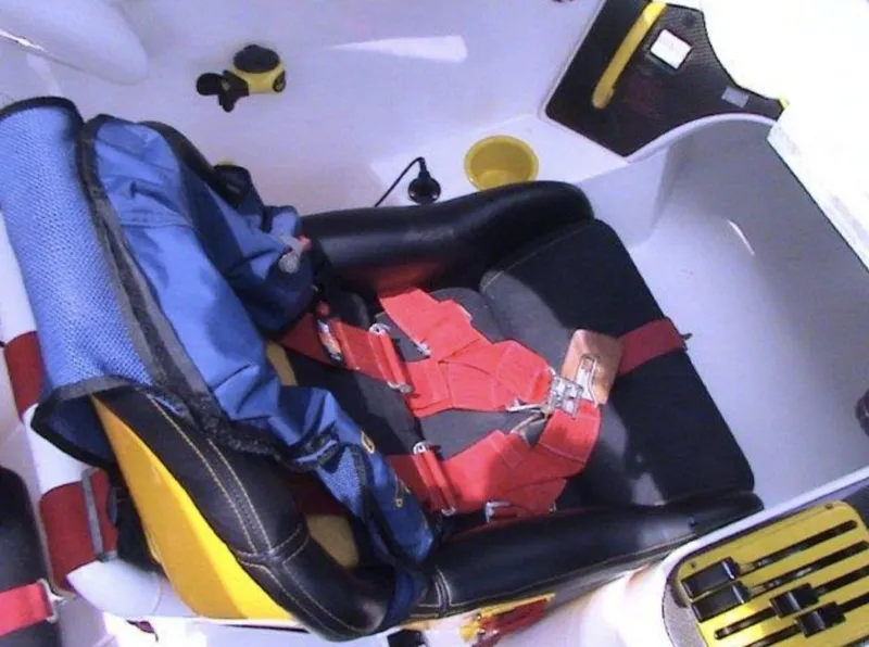 Slide: The Image of 2006 MTI 44 boat interior with safety harness and seat. - 17