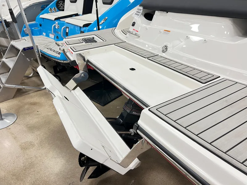 Slide: The Image of 2023 Sea Ray SPX 190 boat with extended swim platform. - 3