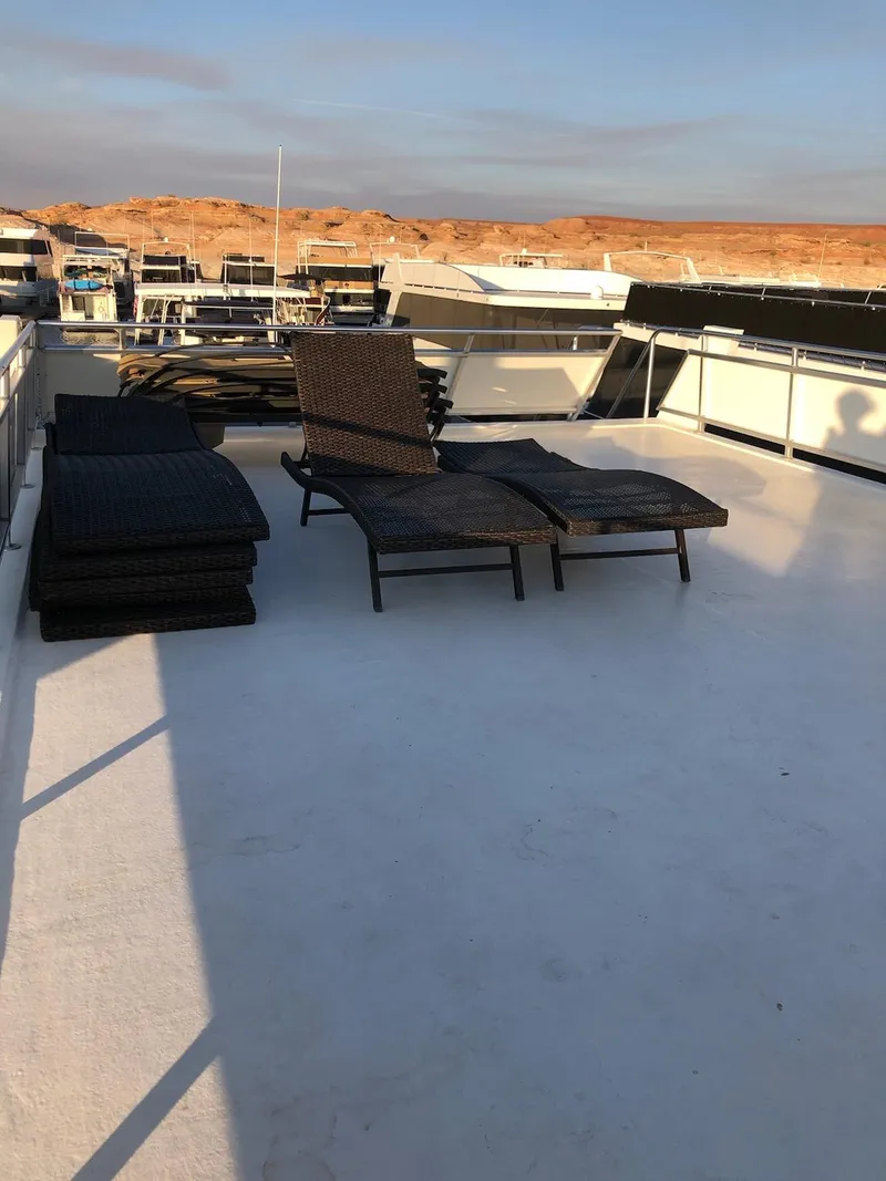 Slide: The Image of Custom 2005 yacht deck with lounge chairs, The Entourage Shares #21,33 and 40. - 12