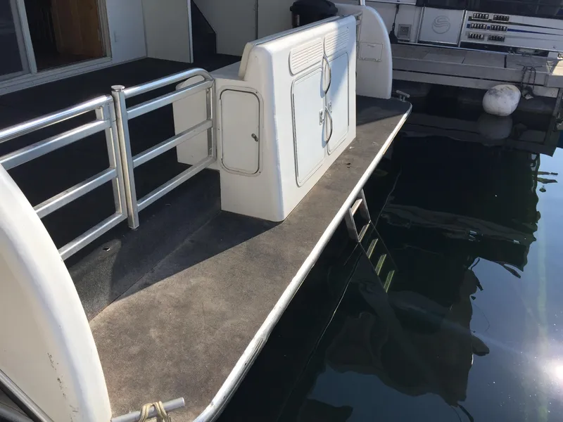 Slide: The Image of Custom 2005 boat model The Entourage Shares #21,33 and 40 docked at marina. - 14