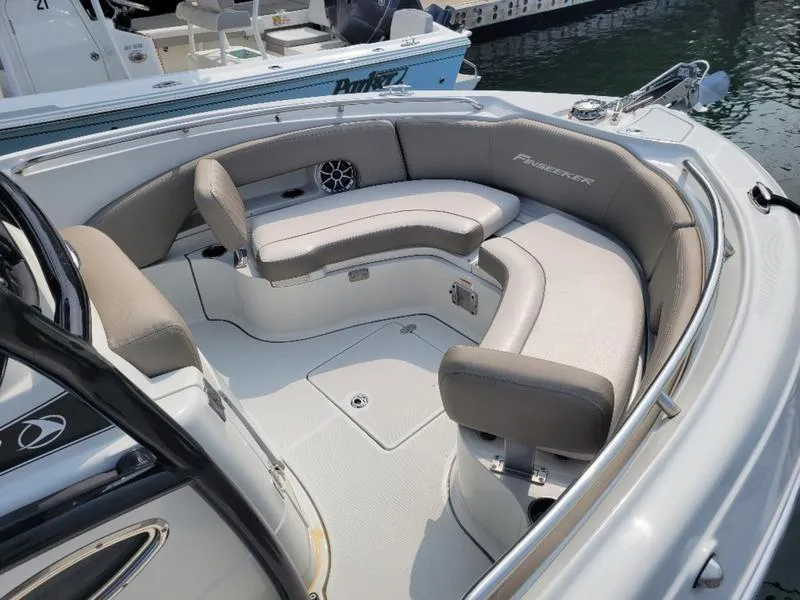 Slide: The Image of 2023 Finseeker 220 boat with spacious seating and modern design. - 5