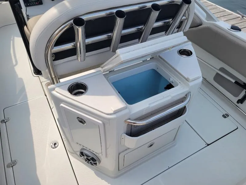Slide: The Image of 2023 Finseeker 220 boat with rod holders and storage compartment. - 6