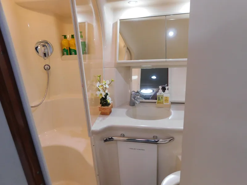 Slide: The Image of Luxurious bathroom in a 2004 Sea Ray 600 Sun Sport yacht. - 20