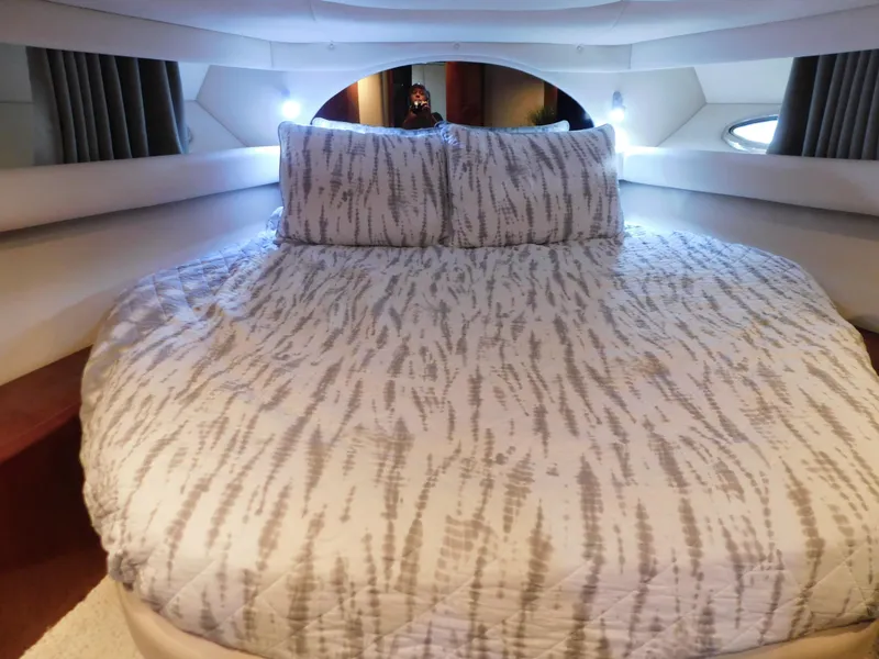 Slide: The Image of Luxurious bedroom in a 2004 Sea Ray 600 Sun Sport boat. - 26