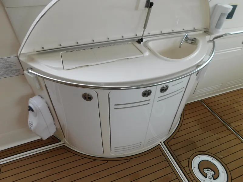 Slide: The Image of Galley area on a 2004 Sea Ray 600 Sun Sport yacht. - 8