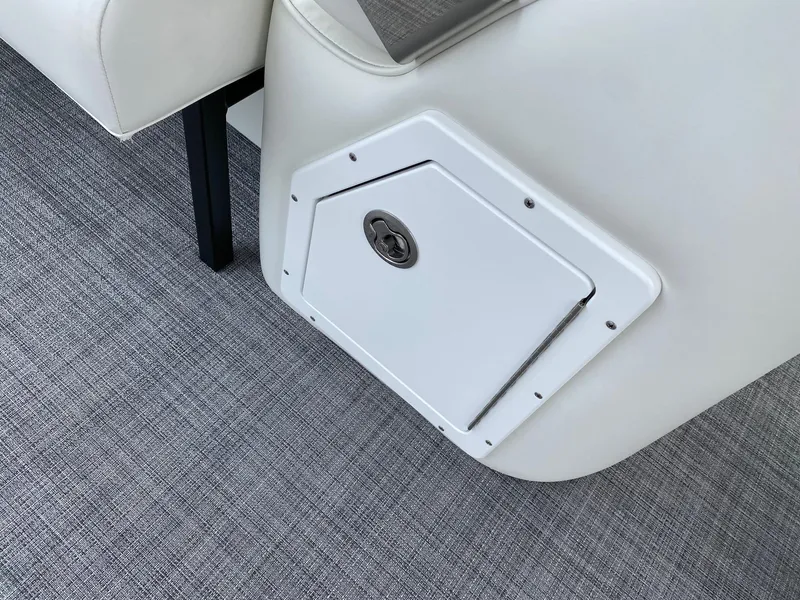Slide: The Image of 2024 JC Neptoon Sport 23TT DSL boat storage compartment on gray carpet. - 18