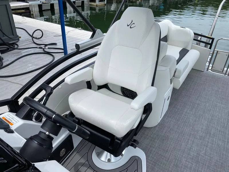 Slide: The Image of 2024 JC Neptoon Sport 23TT DSL captain's chair and helm station. - 14