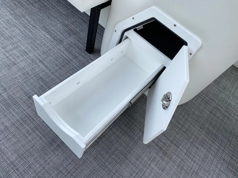 Slide: The Image of Open storage compartment on 2024 JC Neptoon Sport 23TT DSL boat. - 19