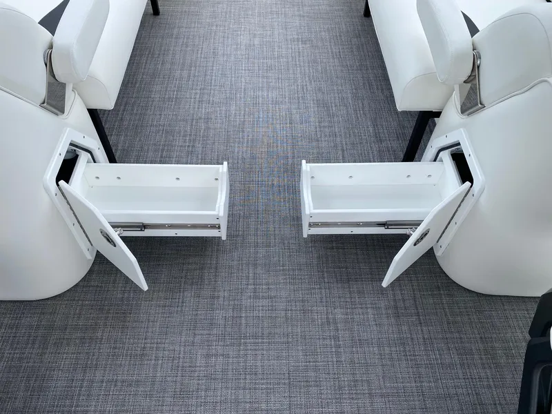 Slide: The Image of 2024 JC Neptoon Sport 23TT DSL boat interior with open storage compartments. - 20