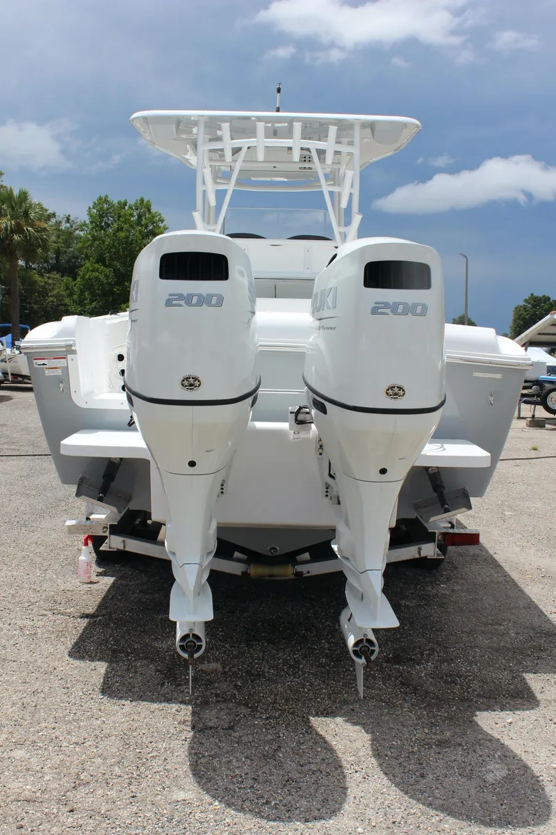 Slide: The Image of 2024 Clearwater 2800 boat with twin outboard engines. - 7