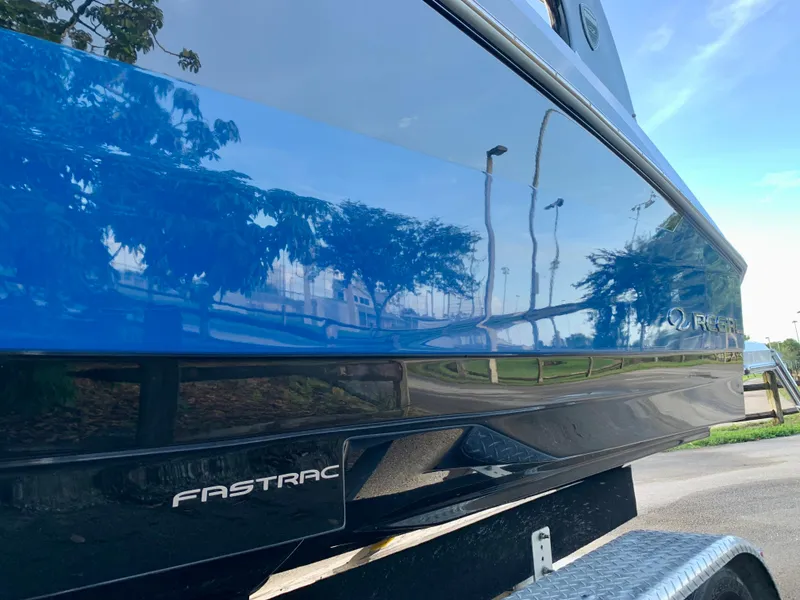 Slide: The Image of 2016 Regal Fastrac boat on trailer, side view. - 22