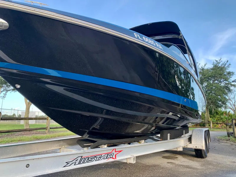 Slide: The Image of 2016 Regal Fastrac boat on Allstar trailer, side view. - 5