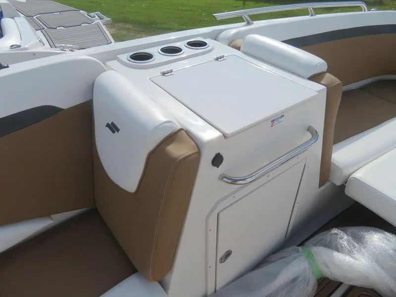 Slide: The Image of 2023 Starcraft SVX OB 231 OB boat interior seating and storage area. - 14