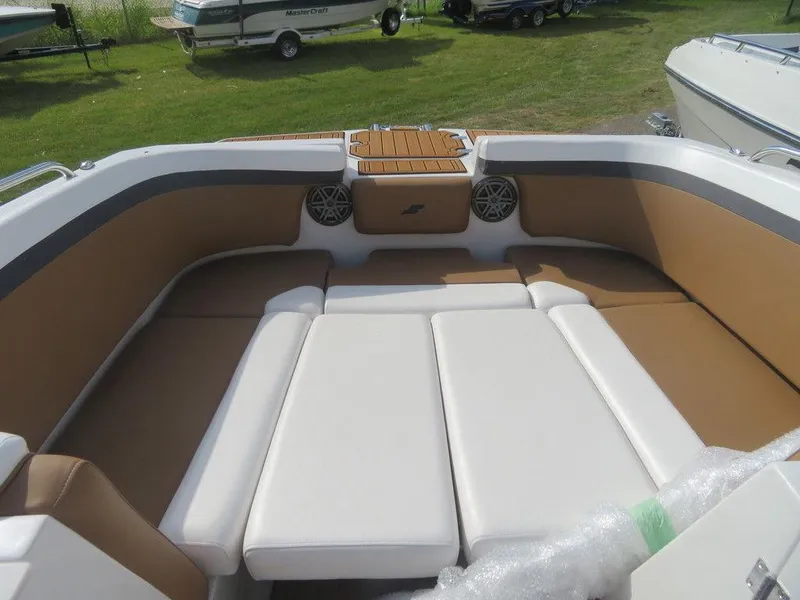 Slide: The Image of 2023 Starcraft SVX OB 231 OB boat interior with spacious seating and modern design. - 15